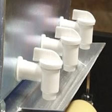 Close-up view: Taps for Jelly Paint and Stain Machine