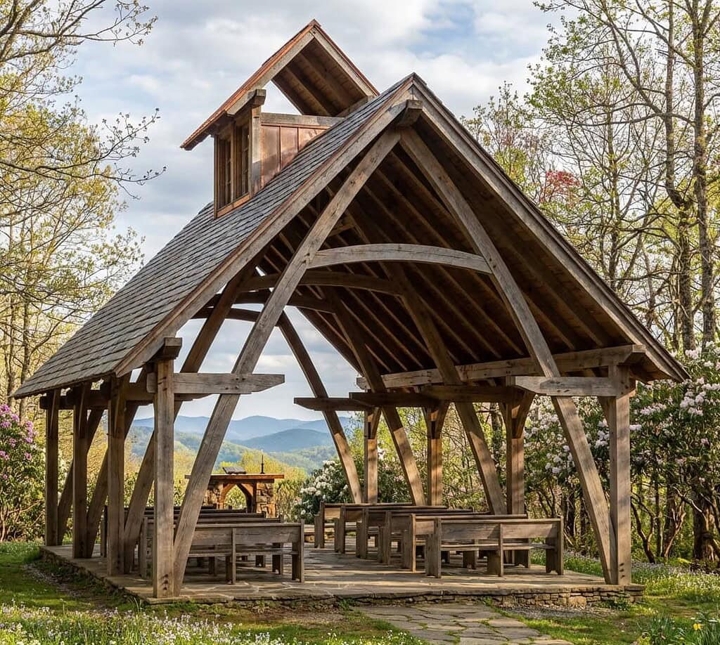 20x36 Cruck Timber Frame chapel exterior with open-air seating and curved timber blades