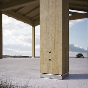 Easy Tie concealed post base installed on timber post anchored to concrete slab on outdoor pergola structure